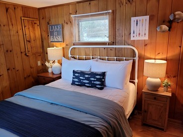 Scenic Lakeside Cabin with Exclusive Boat Dock Near Weirs Beach, Laconia, New Hampshire - Laconia, New Hampshire - glamping.directory
