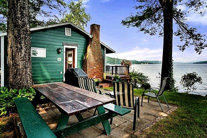 Scenic Lakeside Cabin with Exclusive Boat Dock Near Weirs Beach, Laconia, New Hampshire - Laconia, New Hampshire - glamping.directory