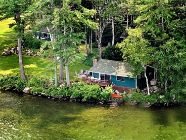 Scenic Lakeside Cabin with Exclusive Boat Dock Near Weirs Beach, Laconia, New Hampshire - glamping.directory