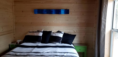 One Bedroom Log Cabin for Family and Pet Friendly Glamping in Pipe Creek, Texas - Pipe Creek, Texas - glamping.directory