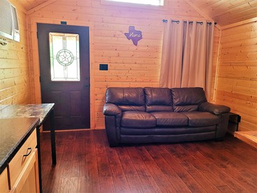 One Bedroom Log Cabin for Family and Pet Friendly Glamping in Pipe Creek, Texas - Pipe Creek, Texas - glamping.directory