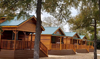 One Bedroom Log Cabin for Family and Pet Friendly Glamping in Pipe Creek, Texas - glamping.directory