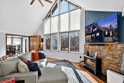 Modern Mountain Chalet with Stone Fireplace & Resort Amenities near Hedgesville, WV - Hedgesville, West Virginia - glamping.directory