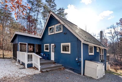 Modern Mountain Chalet with Stone Fireplace & Resort Amenities near Hedgesville, WV - glamping.directory