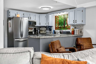 Modern Mountain Chalet with Stone Fireplace & Resort Amenities near Hedgesville, WV - Hedgesville, West Virginia - glamping.directory