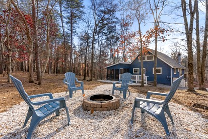 Modern Mountain Chalet with Stone Fireplace & Resort Amenities near Hedgesville, WV - Hedgesville, West Virginia - glamping.directory