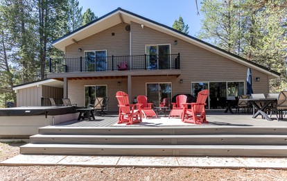 Spacious Riverfront Cabin with Hot Tub and Trail Access Near Outdoor Adventures in Island Park, Idaho - glamping.directory