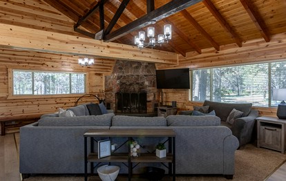 Spacious Riverfront Cabin with Hot Tub and Trail Access Near Outdoor Adventures in Island Park, Idaho - Idaho City, Idaho - glamping.directory