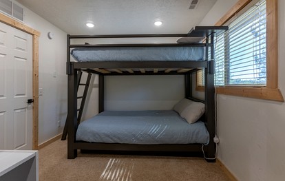 Spacious Riverfront Cabin with Hot Tub and Trail Access Near Outdoor Adventures in Island Park, Idaho - Idaho City, Idaho - glamping.directory