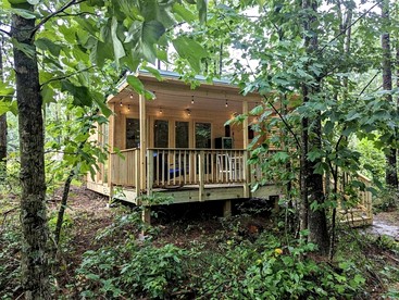 Cozy Scandinavian Cabin with EV Charging on 18-Acre Forest Retreat Near The Caverns & Waterfalls, Coalmont, TN - Coalmont, Tennessee - glamping.directory