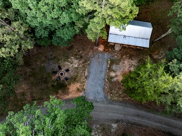 Stunning Riverfront Log Cabin Nestled Amidst Trees in Nashoba, Oklahoma - Nashoba, Oklahoma - glamping.directory