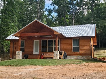 Stunning Riverfront Log Cabin Nestled Amidst Trees in Nashoba, Oklahoma - Nashoba, Oklahoma - glamping.directory