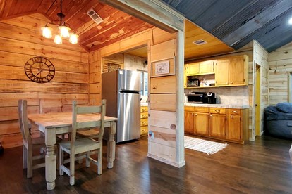Stunning Riverfront Log Cabin Nestled Amidst Trees in Nashoba, Oklahoma - Nashoba, Oklahoma - glamping.directory