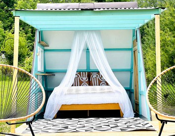 A-Frame Serenity: Tiny Cabin with Panoramic Scenery in Michigan's Tranquil Setting - Boyne Falls, Michigan - glamping.directory