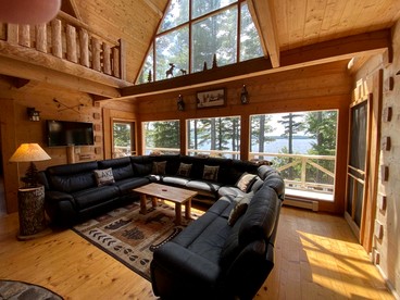 Rustic Luxury Retreat with Panoramic Lake & Mountain Views in Beaver Cove, Maine - Beaver Cove, Maine - glamping.directory