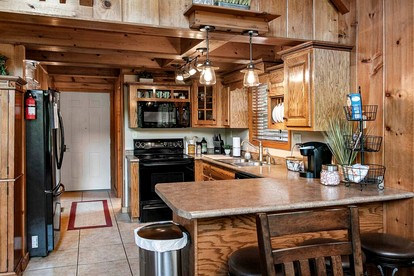 Deluxe Cabin with Three Stunning Decks for a Group Getaway on Norris Lake, Tennessee - Speedwell, Tennessee - glamping.directory