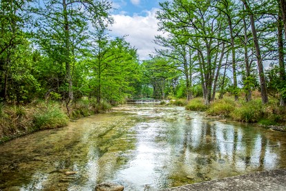 Charming Riverside Cabin Escape with Outdoor Relaxation Spaces in Medina, Texas - Medina, Texas - glamping.directory