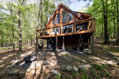 Cozy Cabin with Fire Pit and Games in Paw Paw, West Virginia - glamping.directory