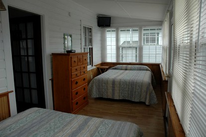 Spacious Cottage Rental Ideal for Group Getaway near Lake Winnipesaukee - Weirs Beach, New Hampshire - glamping.directory