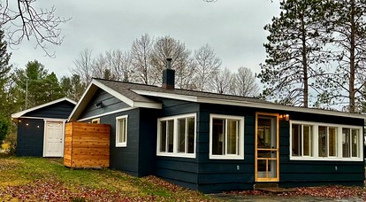 Fantastic Cottage with Fire Pit and River Access in Bellaire, Michigan - glamping.directory