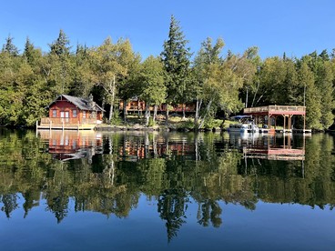 Secluded Waterfront Estate with Boathouse & Panoramic Views in Lake Placid, New York - glamping.directory