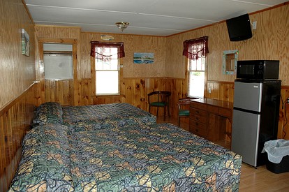 Unique Cottage Rental with Lovely Waterfront Views in New Hampshire - Weirs Beach, New Hampshire - glamping.directory