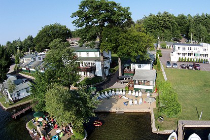 Unique Cottage Rental with Lovely Waterfront Views in New Hampshire - Weirs Beach, New Hampshire - glamping.directory