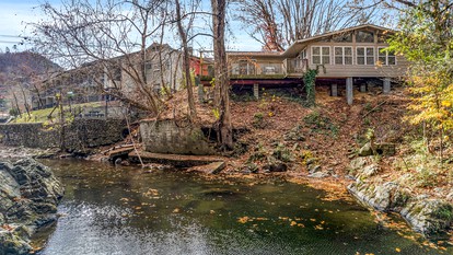 Exclusive Family Retreat: Luxury Rental with Little Pigeon River Views in Tennessee - glamping.directory