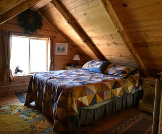 Romantic Cabin Rental with a Delightful Porch near Ennis, Montana - Whitehall, Montana - glamping.directory