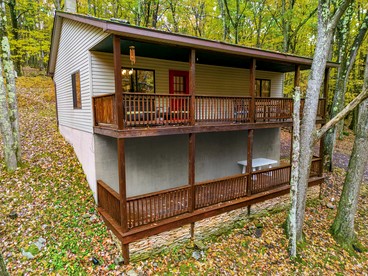 Spacious Cabin Retreat with Hot Tub, Deck, Resort Amenities in Terra Alta, WV - glamping.directory