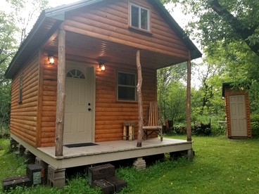 Cozy Creekside Cabin Rental for a Secluded Weekend Getaway in Wisconsin - glamping.directory