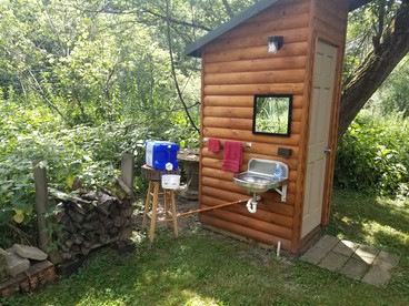 Cozy Creekside Cabin Rental for a Secluded Weekend Getaway in Wisconsin - Sparta, Wisconsin - glamping.directory