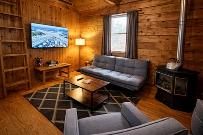 Dreamy Lofted Cabin with Direct Lake Access in Maine - Beaver Cove, Maine - glamping.directory