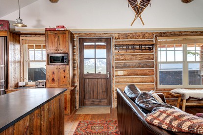 Rustic and Cozy Log Cabin with Ski-in Access, Hot Tub, and Fire Pit in Big Sky, Montana - Big Sky, Montana - glamping.directory