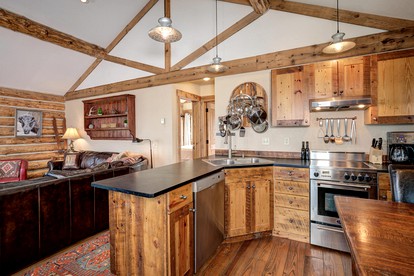 Rustic and Cozy Log Cabin with Ski-in Access, Hot Tub, and Fire Pit in Big Sky, Montana - Big Sky, Montana - glamping.directory