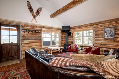 Rustic and Cozy Log Cabin with Ski-in Access, Hot Tub, and Fire Pit in Big Sky, Montana - Big Sky, Montana - glamping.directory