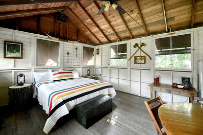 Three Cozy Historic Scout Cabins with Fire Pit, BBQ, and Hammocks for a Memorable Family Adventure in Troy, Wisconsin - East Troy, Wisconsin - glamping.directory