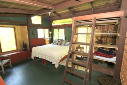 Secluded Cabin with Private Deck Overlooking Organic Garden in Pahoa, Hawaii - Pahoa, Hawaii - glamping.directory