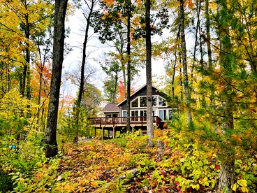 Group Lake Cabin with Ping Pong Table Loaded with Kayaks in Wisconsin - Stone Lake, Wisconsin - glamping.directory