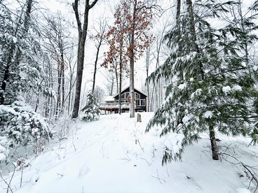 Group Lake Cabin with Ping Pong Table Loaded with Kayaks in Wisconsin - Stone Lake, Wisconsin - glamping.directory