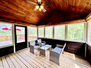 Group Lake Cabin with Ping Pong Table Loaded with Kayaks in Wisconsin - Stone Lake, Wisconsin - glamping.directory