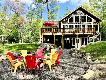 Group Lake Cabin with Ping Pong Table Loaded with Kayaks in Wisconsin - Stone Lake, Wisconsin - glamping.directory