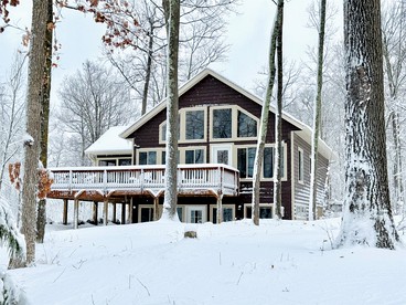 Group Lake Cabin with Ping Pong Table Loaded with Kayaks in Wisconsin - Stone Lake, Wisconsin - glamping.directory