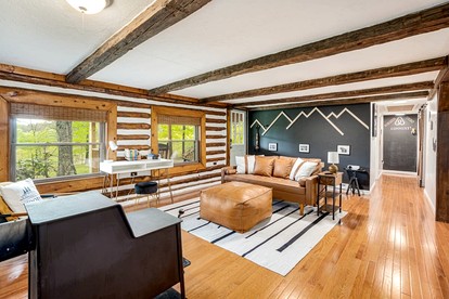 Modernized Log Cabin with Hot Tub, Fire Pit and Amazing Views Just Minutes from the Cacapon Mountains in Berkeley Springs, WV - Berkeley Springs , West Virginia - glamping.directory