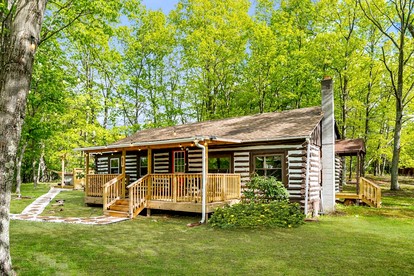 Modernized Log Cabin with Hot Tub, Fire Pit and Amazing Views Just Minutes from the Cacapon Mountains in Berkeley Springs, WV - glamping.directory