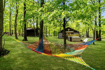 Modernized Log Cabin with Hot Tub, Fire Pit and Amazing Views Just Minutes from the Cacapon Mountains in Berkeley Springs, WV - Berkeley Springs , West Virginia - glamping.directory