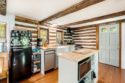 Modernized Log Cabin with Hot Tub, Fire Pit and Amazing Views Just Minutes from the Cacapon Mountains in Berkeley Springs, WV - Berkeley Springs , West Virginia - glamping.directory