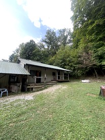 Rustic Cabin Perfect for Small Groups with Picnic Space in Indiana - Nashville, Indiana - glamping.directory