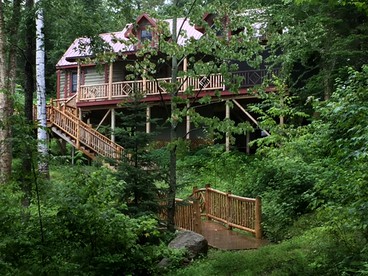 Elegantly Rustic Cabin on Secluded Island near Lake Placid on Saranac Lake, New York - glamping.directory