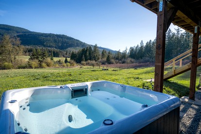 Amazing Mountain Views in this Charming Cottage with a Hot Tub in Sequim, Washington - glamping.directory